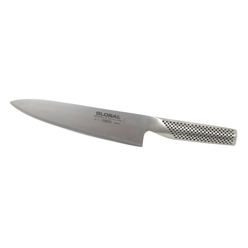 Detalle del mango con textura de hoyuelos del cuchillo chef Global G-2