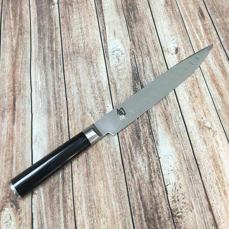 Cuchillo fileteador alveolado